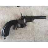 A mid-19th century breech-loading rimfire pistol, with 5-inch octagonal steel barrel, hinged with