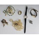 A small collection of assorted jewellery and watches comprising a 9ct gold cased Roamer, a pearl