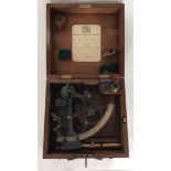 An ebonised metal and brass sextant by Kelvin, White & Hutton, in fitted walnut hinged square box