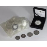 A collection of approximately 35 assorted silver proof struck coins, including £1, 10p and £5 coins,