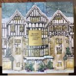 Five Liberty & Co advent calendars, each with 24 drawers and printed with William Morris designs and