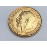 King George V sovereign, 1913, obv bare head, rv George & Dragon, weight 8.0g, condition VF.