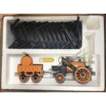 A Hornby Railways 3.5" gauge Stephensons Rocket G100 locomotive and tender set, a G104 coach, with