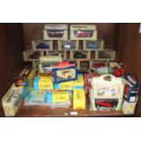 SECTION 42. A collection of approximately 41 assorted boxed die-cast model cars, including