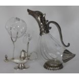 A silver-plated brandy warmer modelled as a Middle Eastern oil lamp, with glass brandy balloon,
