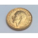 King George V sovereign, 1914, obv bare head, rv George & Dragon, weight 8.0g, condition VF.