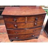 A 19th century bow-front mahogany chest of drawers, on turned feet, (af), together with an Edwardian