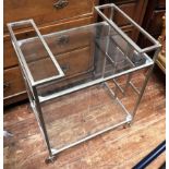 A modern zinc-plated, metal and glass two-tier drinks trolly, 77cm high x 63cm wide