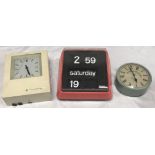 Two clocks circa 1970s distributed by Blick International including French Bodet flip clock in red