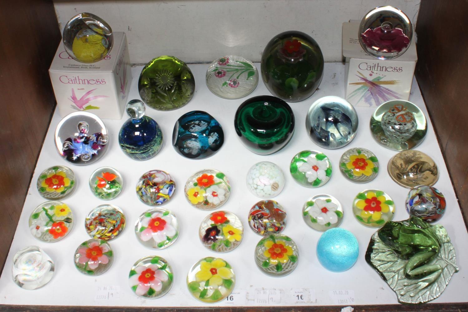 SECTION 16. A collection of 34 assorted glass paperweights including two boxed Caithness