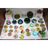 SECTION 16. A collection of 34 assorted glass paperweights including two boxed Caithness