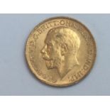 King George V sovereign, 1913, obv bare head, rv George & Dragon, weight 8.0g, condition VF.