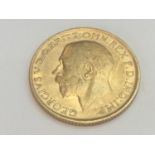 King George V sovereign, 1912, obv bare head, rv George & Dragon, weight 8.0g, condition VF.