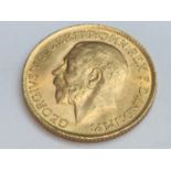 King George V sovereign, 1912, obv bare head, rv George & Dragon, weight 8.0g, condition VF.