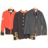 Four various British military uniforms including Devonshire & Dorset regiment jacket and trousers,
