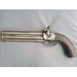 A 19th century Continental percussion lock pistol, with 7.5 inch over-and-under steel barrels (