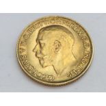 King George V sovereign, 1915, obv bare head, rv George & Dragon, weight 8.0g, condition VF.