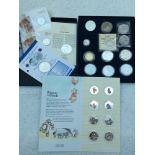 A Kojn Club Winnie The Pooh collection of 8x enamelled 50p pieces, sealed, a Britannia 1oz Fine