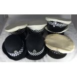 Seven various Police caps, six with chrome badges including Policemen's West Yorkshire, Greater