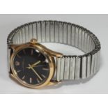 A gents Rolex Oyster Perpetual Air King c.1960, reference '5506', the black dial with gilt batons