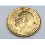 King George V sovereign, 1913, obv bare head, rv George & Dragon, weight 8.0g, condition VF.