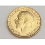 King George V sovereign, 1912, obv bare head, rv George & Dragon, weight 8.0g, condition VF.