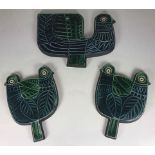 Three various Robert Jefferson for Poole Pottery wall plaques formed as stylised birds, each