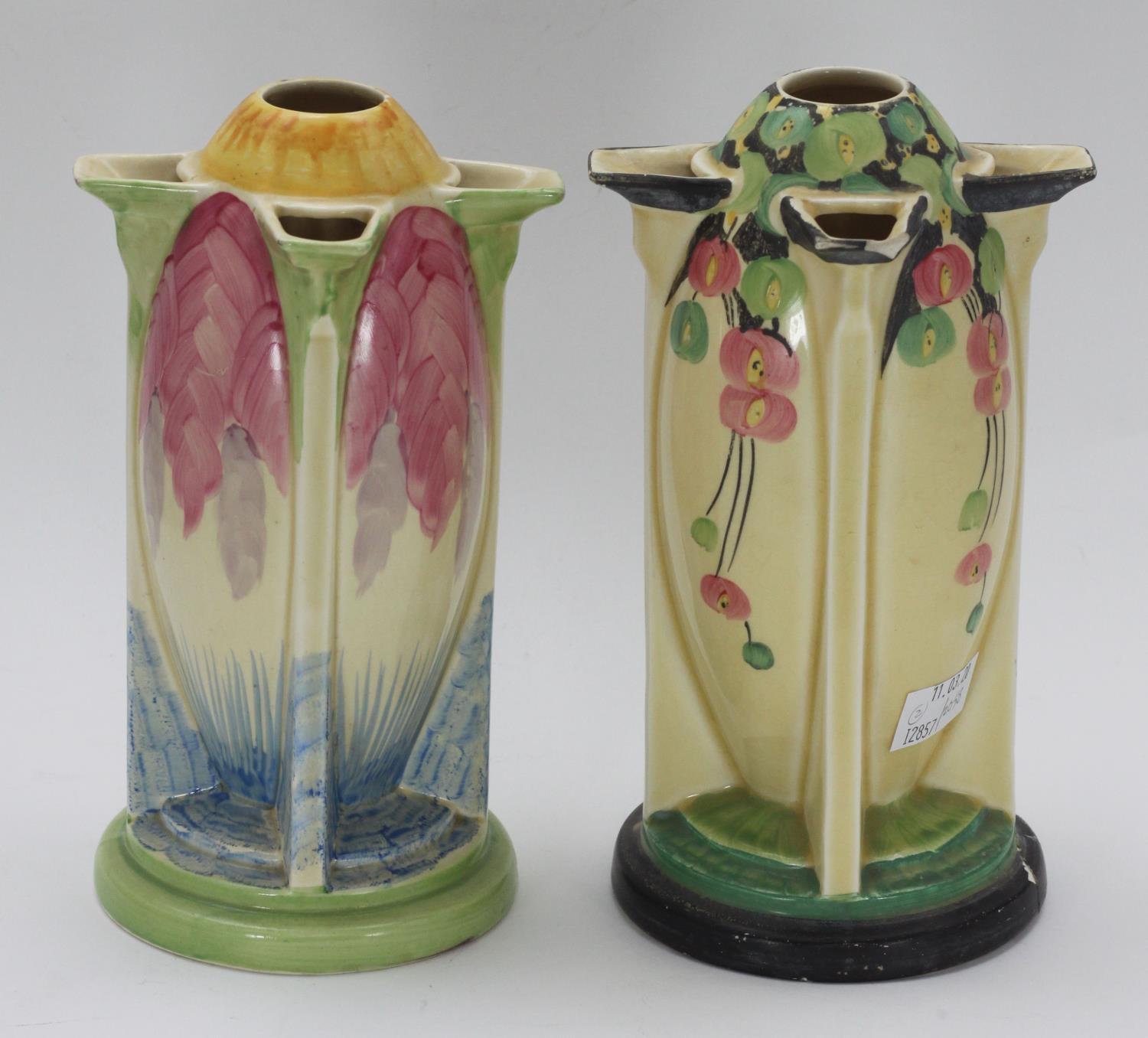 Two Art Deco Myott Son & Co. pottery 'Torpedo' vases, one hand painted with a pink, blue and green