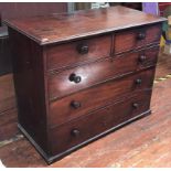 A mid Georgian mahogany chest of two short and three long graduated solid mahogany drawers and solid