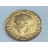 King George V sovereign, 1912, obv bare head, rv George & Dragon, weight 8.0g, condition F.