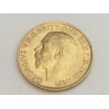 King George V sovereign, 1911, obv bare head, rv George & Dragon, weight 8.0g, condition VF.