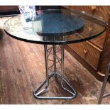 A 20th century tubular chromium 'pylon' table, with single tripartite central support, circular