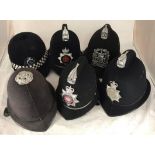 Five various Police Custodian (Bobby) helmets, four with chrome plates to Hampshire Police,
