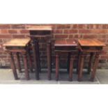 Three Indian wooden jardiniere/lamp tables with black metal stud and arch detail, 30cm diam,