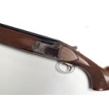 A Winchester 6500 Sporter -12GA Winchoke shotgun -70mm, over/under, serial number K547800E, walnut