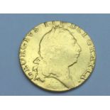 King George III Guinea, 1793, obv fifth laurel head, rv spade shaped shield, weight 8.3g,