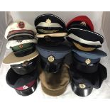 Twelve various Police / military peaked caps including Royal Military Police, RAF, Royal Dublin