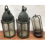 A pair of submarine flood lamps by Siebe Gorman & Co Ltd, London, the domed cover with swivel