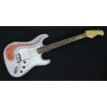 A Burswood Stratocaster style electric guitar with three single-coil pickups, white scratch plate,