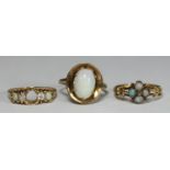 A 14ct gold ring marked '585' with oval opal set in oval dished setting, 4.2g, together with an 18ct