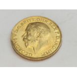 King George V sovereign, 1914, obv bare head, rv George & Dragon, weight 8.0g, condition VF.