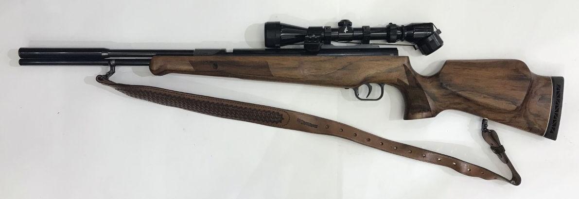 A Theoben SLR-88 .22 air rifle, with under-lever compressing spring loading with five 6-shot