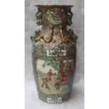 An early 20th century Chinese Canton enamel baluster vase, the sides with panels depicting