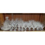 A quantity of assorted cut glass comprising two decanters and stoppers, a jug, a set of six wine