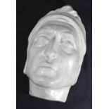 A ceramic death or funerary mask of a middle-aged European man wearing a nightcap, 26cm