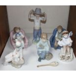 SECTION 26. Five Nao porcelain figures including a pair of seated children playing with toys, a