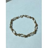 A ladies 9ct gold bracelet, weighing approximately 4.3 grams.