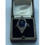 A lady's victorian 18ct yellow gold and platinum Sapphire coloured and Diamond dress ring. The ring
