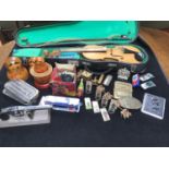 A mixed lot of collectables including a student violin, Russian stacking dolls, various lighters,
