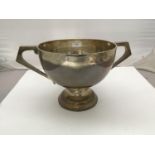 A two-handled silver bowl by Walker & Hall, of circular form and raised on circular spreading